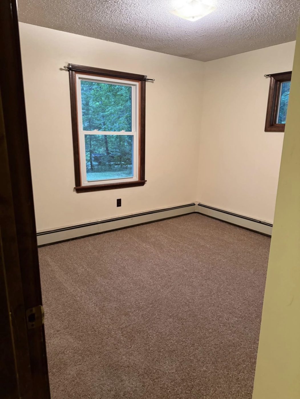 Bedroom with new carpet and fresh paint